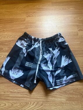 Civil Regime floral mesh shorts